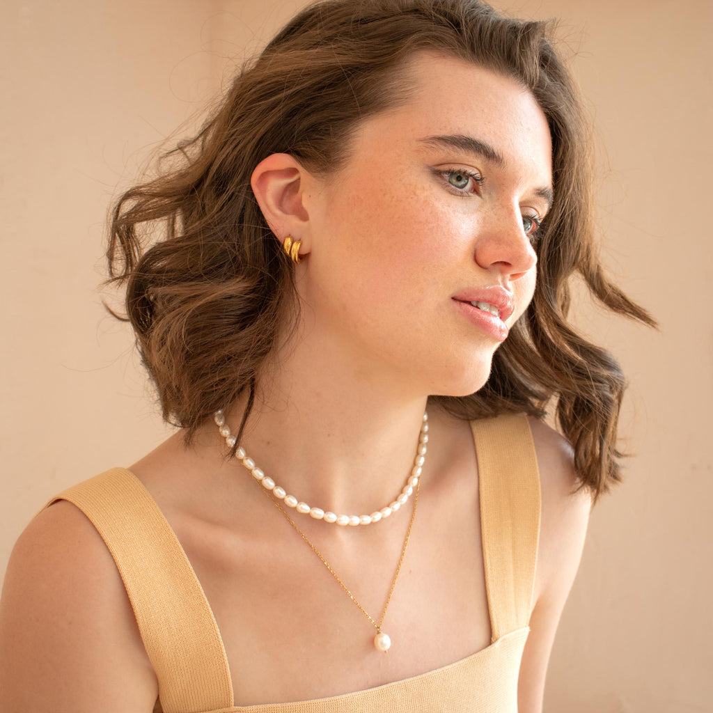 Ensemble de bijoux de perles et acier inoxydable couleur or