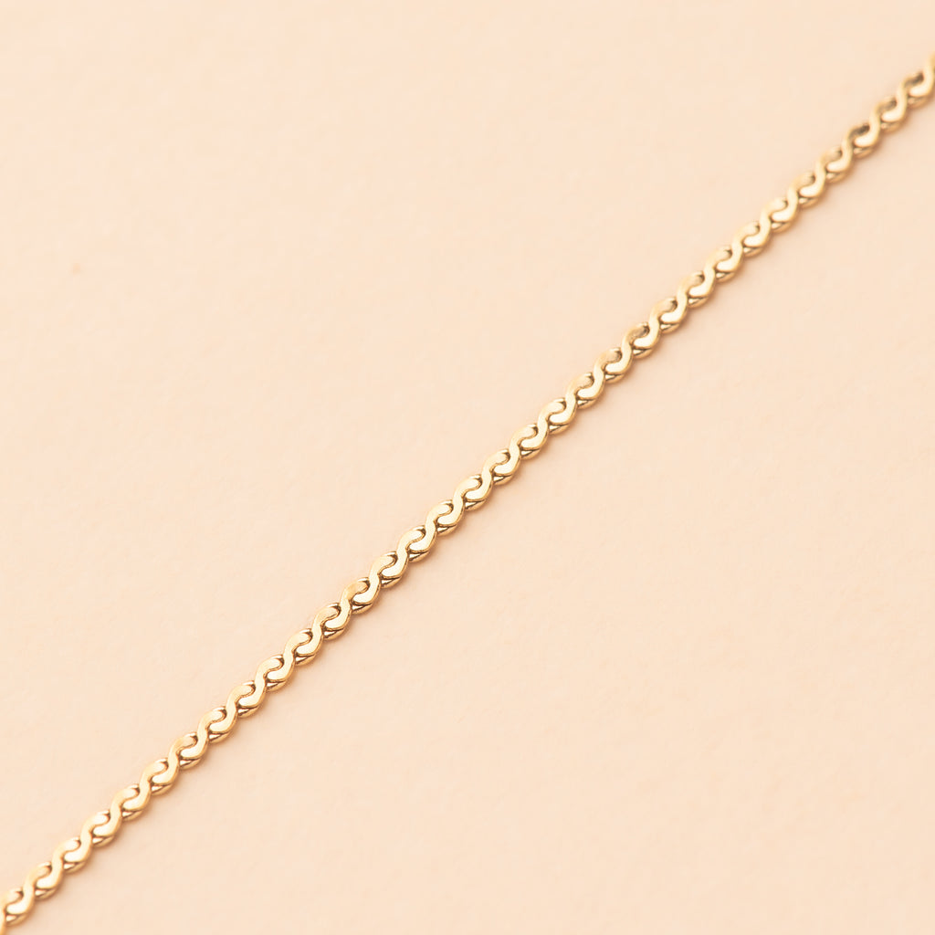 Chaine mini serpent or en acier inoxydable