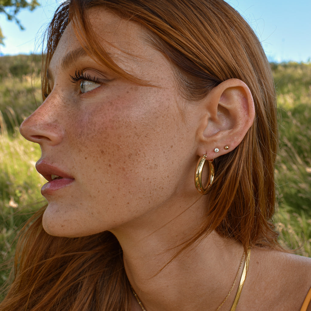 Boucles d'oreilles Tania gold avec zircon cubique